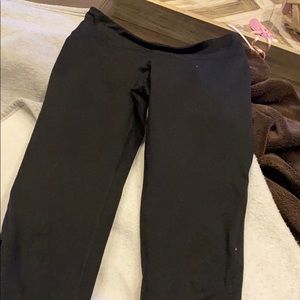 Champion black leggings with crosses on side
